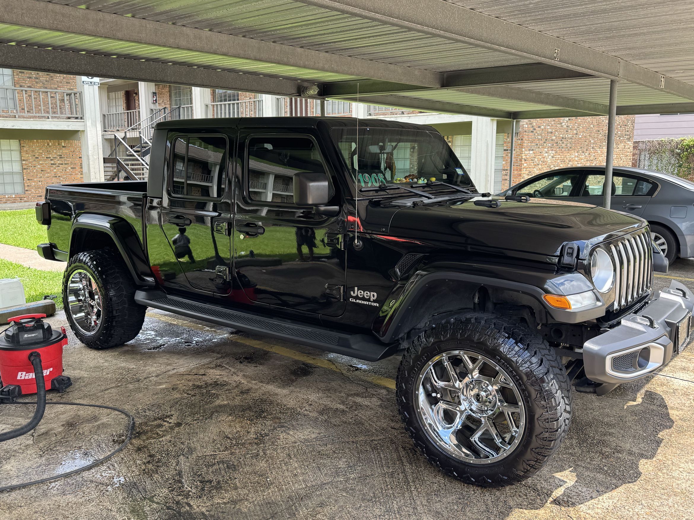 Black Jeep Gladiator after a full PADS hand wash and wax