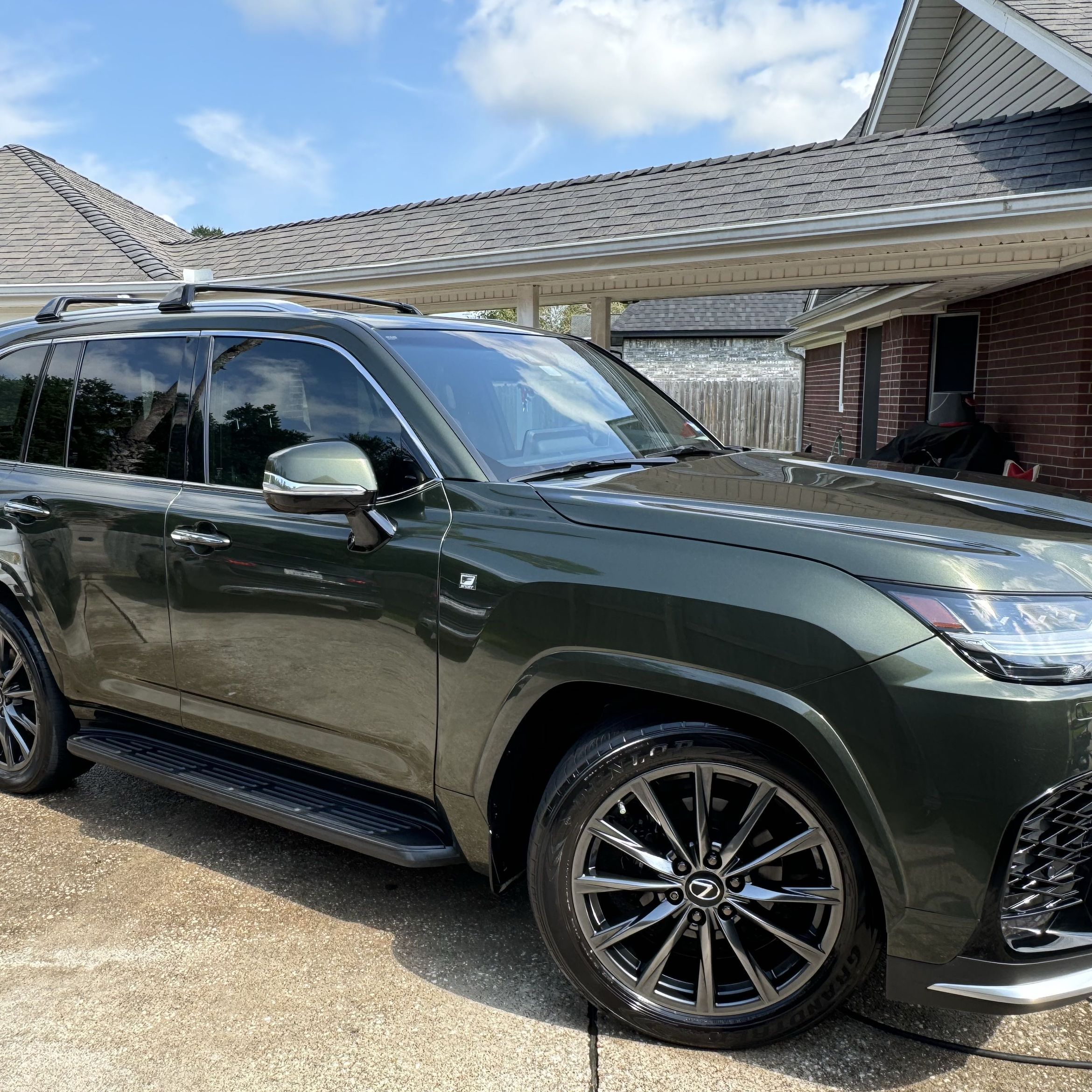 Green Lexus LX F-Sport after a hand wash and wax