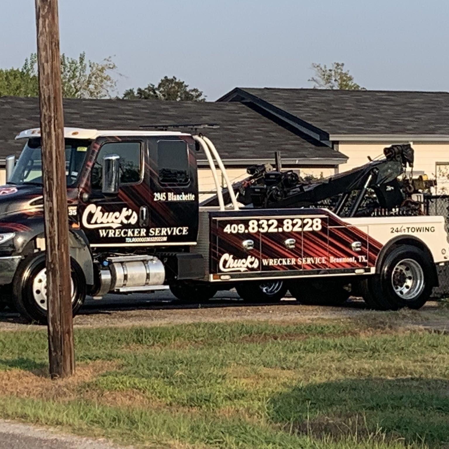 Chuck's Wrecker Service tow truck washed and shining