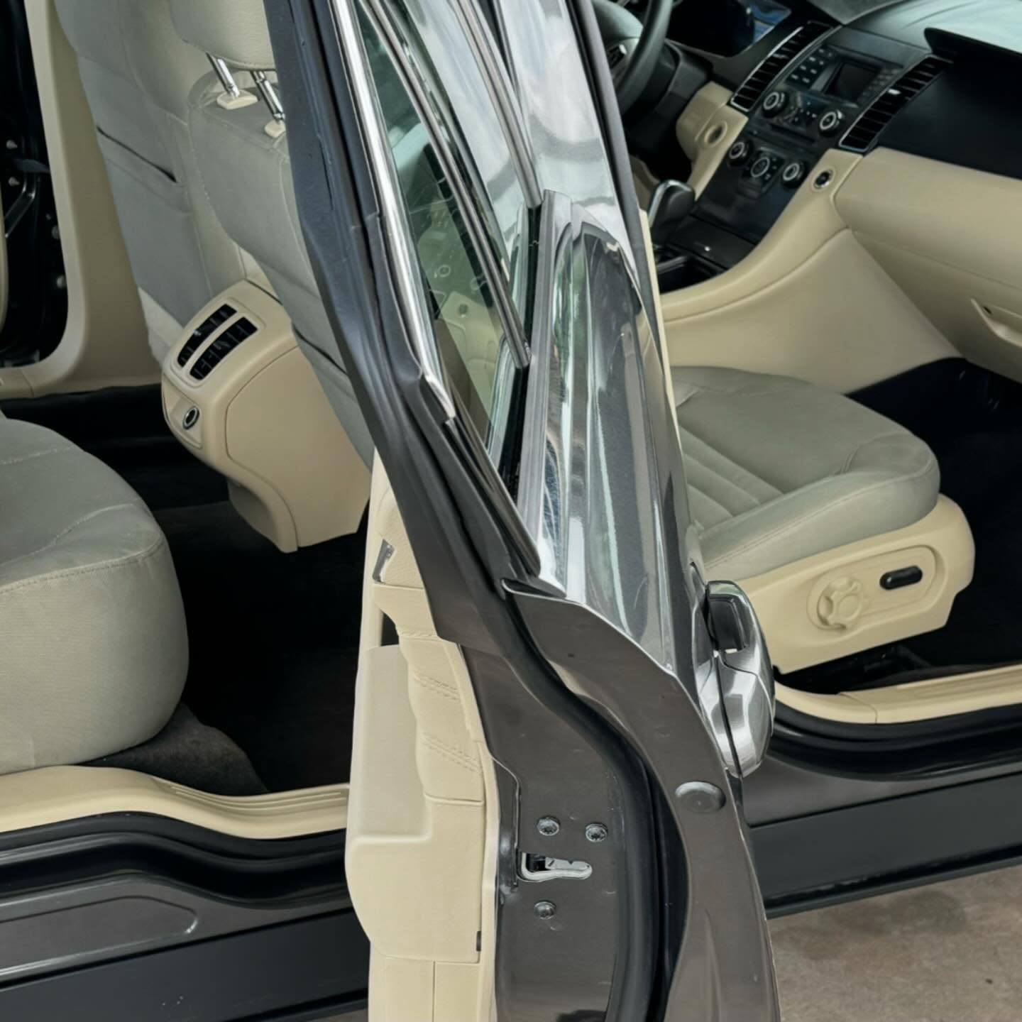 Ford Taurus tan leather interior after deep clean